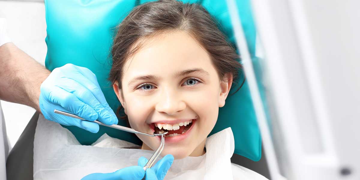 Child Patient In Dental Room